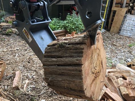 mini excavator log splitter|mini excavator wood splitter attachment.